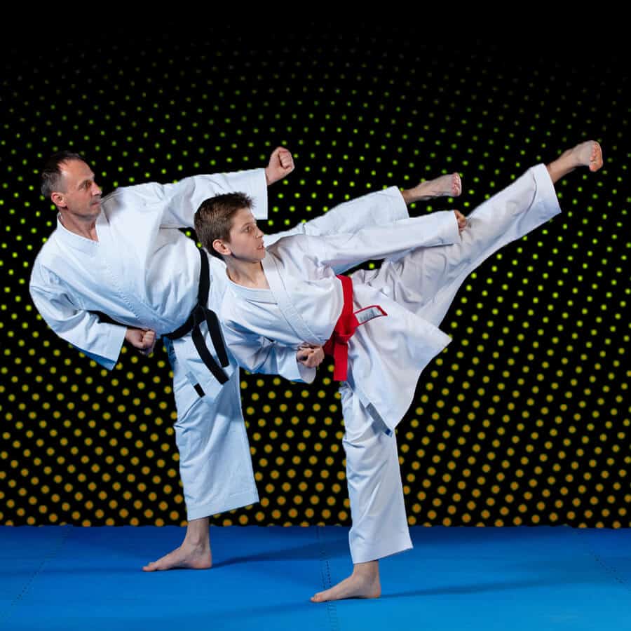 Martial Arts Lessons for Families in Nutley NJ - Dad and Son High Kick